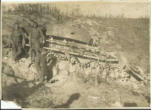 Soviet soldiers at the destroyed tank