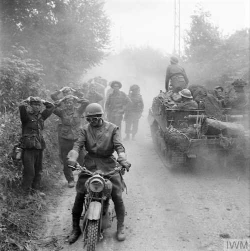 POWs escorted to the rear