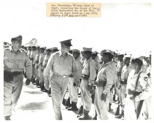 Eisenhower inspecting the 147th Replacement Bn.