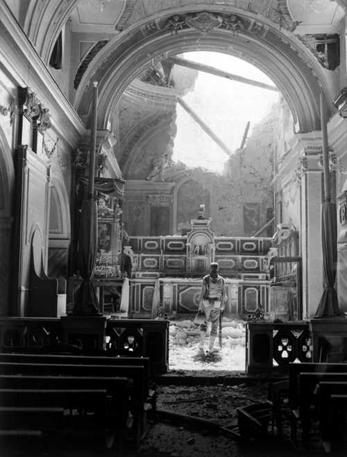 Soldier in Damaged Church