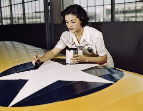 Woman Painting Insignia