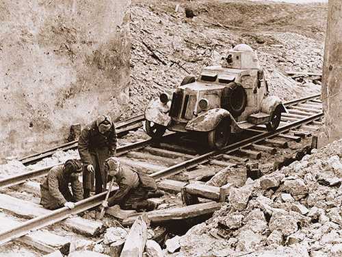 Repair railroad tracks.