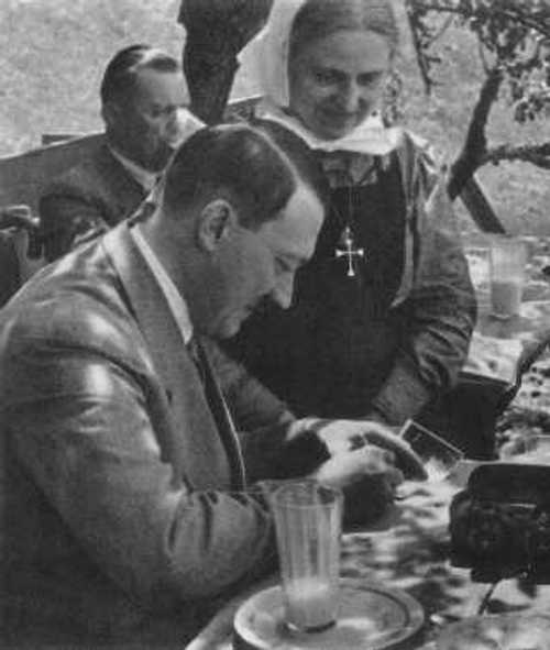 Hitler signing autographs