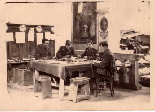 Italians doing paperwork in Tobruk