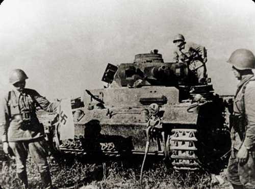 At the crippled German tank 
