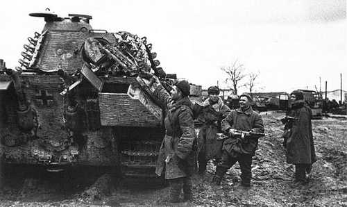 Soviet soldiers near captured Panther tank.