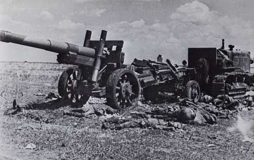 Soviet artillery piece and tractor strafed