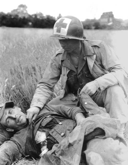 Medic Helps Wounded German