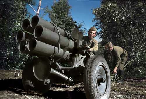 Soldiers prepare a captured six-barrel mortar for 