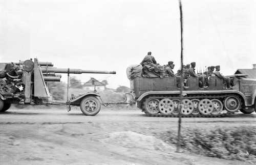 Half-track moves an artillery piece