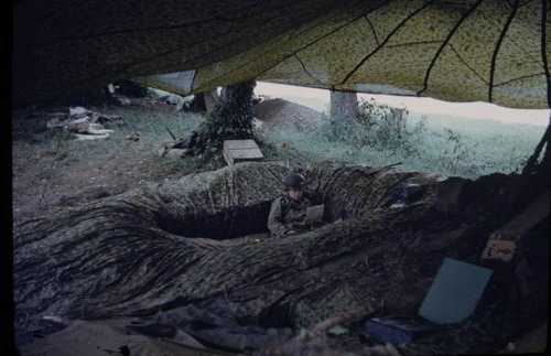 Paratrooper reads a letter from home