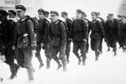 SA troops march .