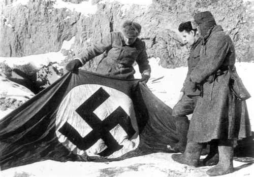 A captured flag wth a swastika