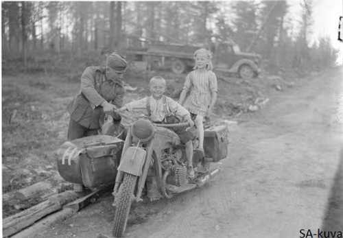 Motorcycle runner and kids