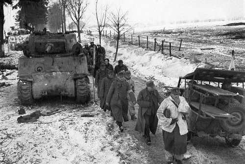 POWs to the rear