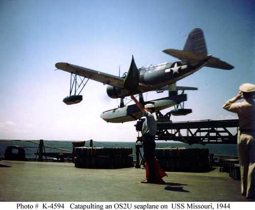 Catapulting an OS2U  seaplane on USS Missouri