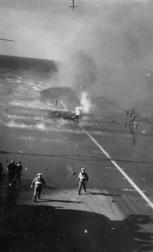 HMS Illustrious hit and on fire