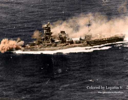 Battleship Hiuga under fire.