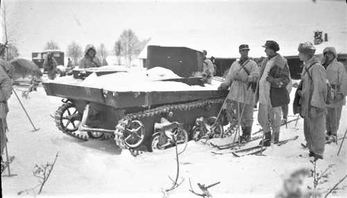 Ski troops inspect Soviet tank