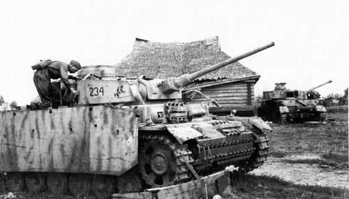 Red Army soldiers inspect abandoned tank Pz.III Au