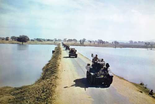 Armored Column Crosses Jetty