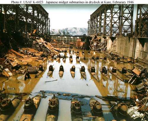 Japanese midget submarines in drydock at Kure