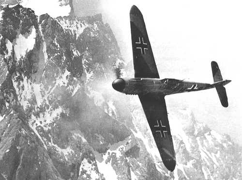 In front of a steep ridge