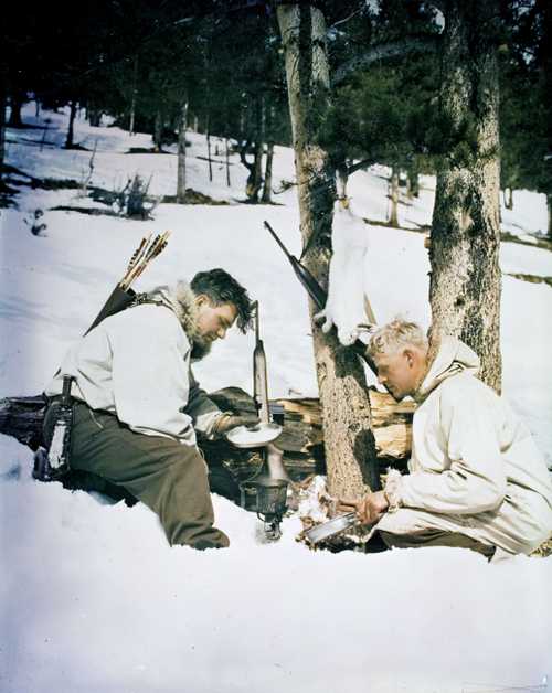 Soldiers Eating in Snow
