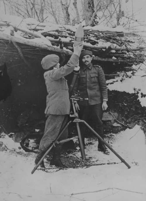 Firing the 120mm Mortar.