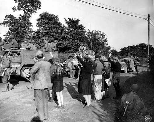 Residents welcome armored column