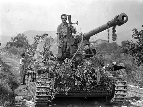L/Cpl J.A. Thrasher with his PIAT gun