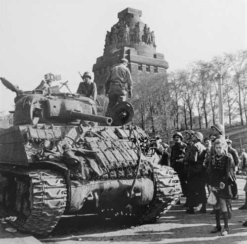 Tank in front of monument