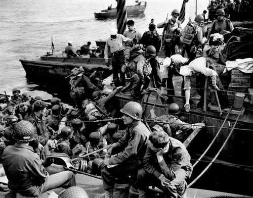 Men and supplies to landing crafts