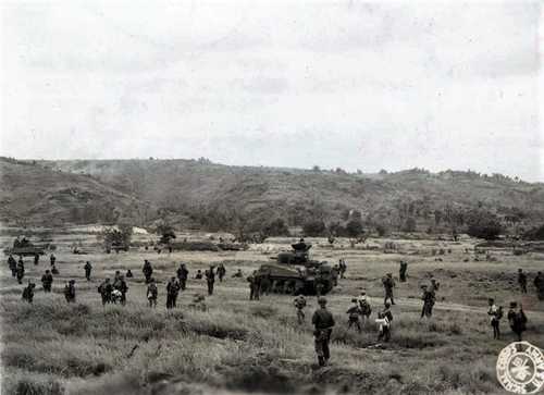 Tanks and infantry advance
