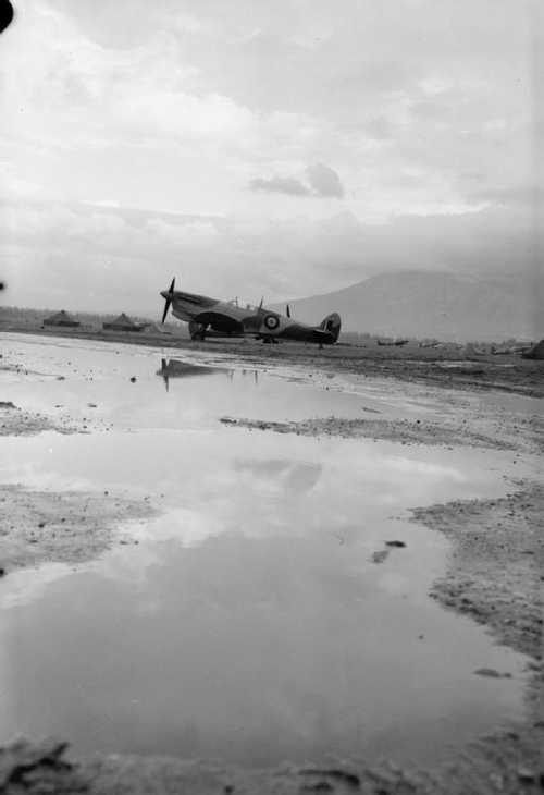 Spit on waterlogged airfield