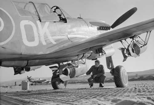 A Kittyhawk and its bombs