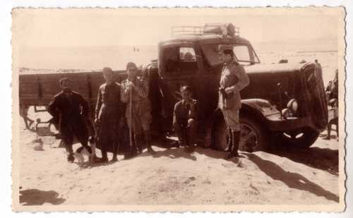 Digging out a truck stuck in the sand