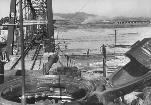 Shelling across a river