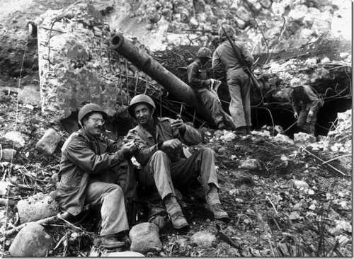 Joe Rosenthal rests with a Marine