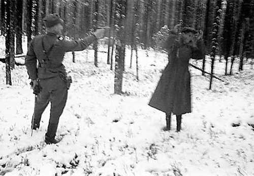 Soviet spy getting shot by finnish soldier.