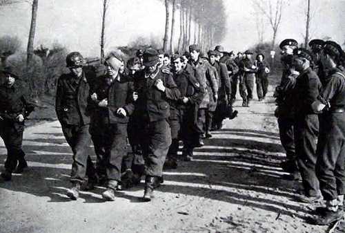 POWs marched to the rear