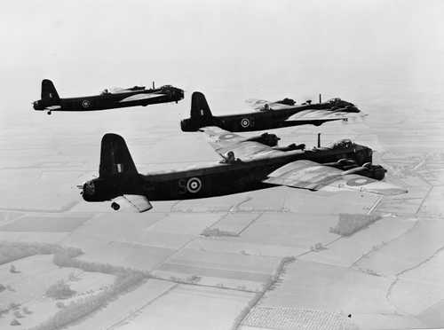 Three Stirling Bombers in Flight