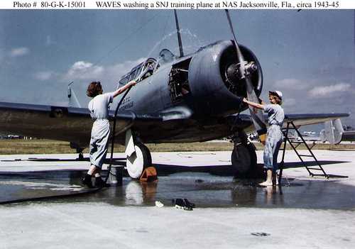 WAVES washing a SNJ training plane