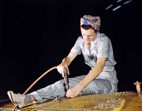 Woman Drilling on Aircraft