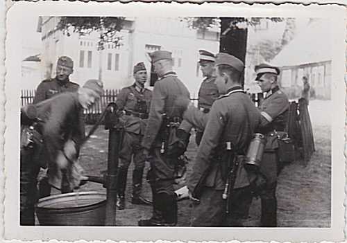 Germans at water well