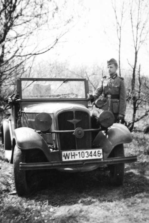 German soldier with vehicle.