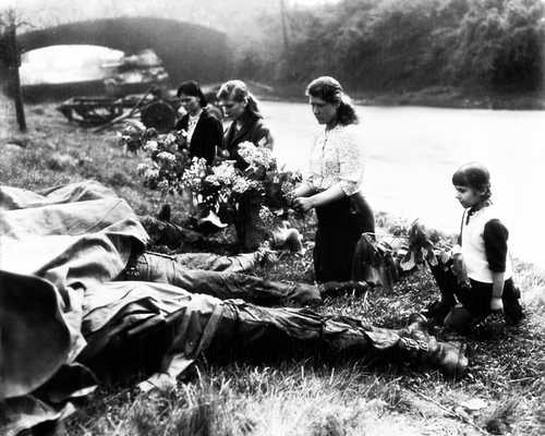 Russian women lay flowers