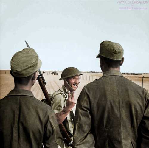 A British soldier who laugh gives a V sign
