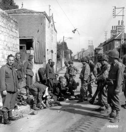 GI's guarding some German prisioners