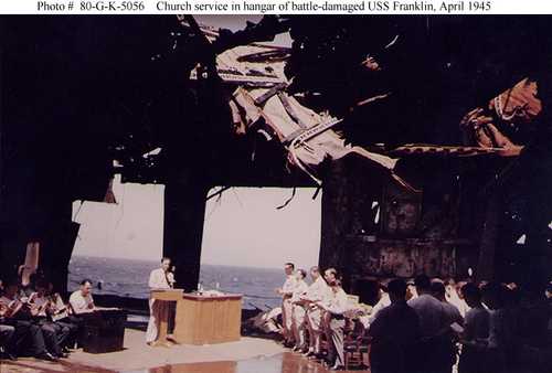 Church service in hanger of battle-damaged USS Franklin